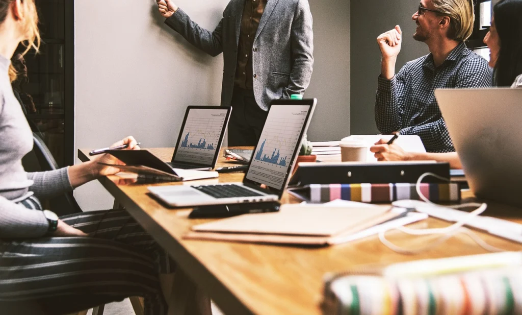Business team reviewing sales pipeline for MRR forecast